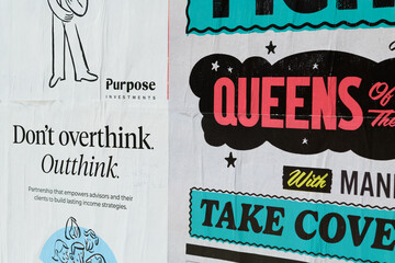 Fototapeta premium street posters in Toronto (Purpose Investments and concert promotion for Queens of the Stone Age + Mannequin Pussy + Take Cover)