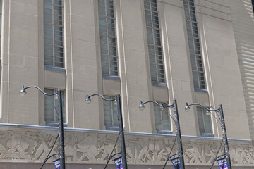 Fototapeta premium facade of the Toronto Stock Exchange Building at 234 Bay St, designed by George & Moorhouse with SH Maw in Art Deco style, 1937 (carved stone frieze by Charles Comfort)