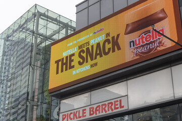 Fototapeta premium digital advertising on the exterior of Yonge Eglinton Centre, a shopping mall (for The Snack Nutella and Peanut), Toronto