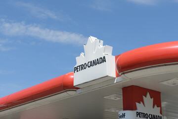 Fototapeta premium Petro-Canada logo sign on their gas bar canopy located here at 1750 Bloor St W, east of Keele St, Toronto