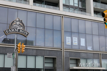 Fototapeta premium commercial building facade and sign of Farm Boy, a fresh food market, located here at 2149 Yonge St, Toronto