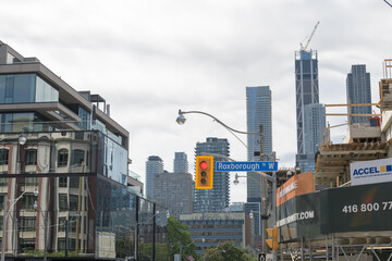 Fototapeta premium looking south on Yonge St from One Roxborough West (at right) on an overcast morning in Toronto