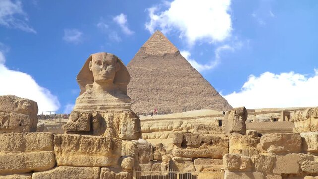 Sphinx and Great Pyramid of Giza in Egypt Desert Under Clear Sky Ancient Egyptian Monument Architecture and Historic Travel Landmark in Cairo