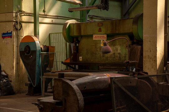 Abandoned old industrial textile research institute with laboratory chemistry glass, machinery workshop and factory hall