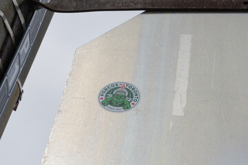 Fototapeta premium PORCOS Toronto slap on the back of a metal sign in the city (supporters' group for Palmeiras, the São Paulo football club)