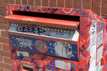 Fototapeta premium close-up of a grungy Canada Post red street-corner drop box, known as Street Letter Boxes (SLBs), Toronto