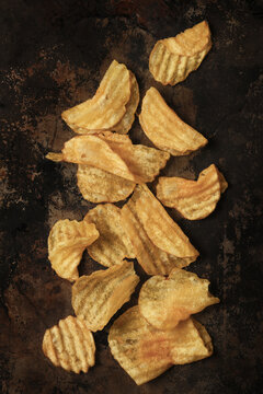 Flat Lat still life of a Potato Chips on a baking sheet.