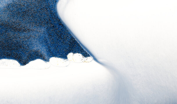 Close-up of falling sand in a relaxation desktop sand motion devices with a transparent background

