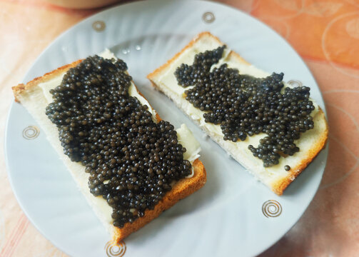 Luxury sandwiches black caviar food background