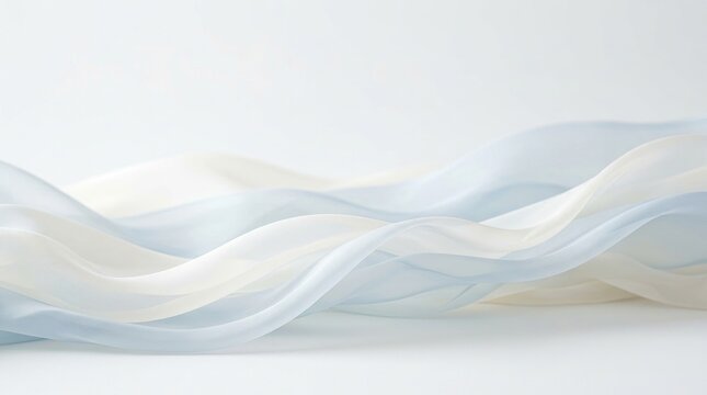 Soft, flowing fabric drapes elegantly over a white surface. The fabric exhibits a gradient of pale beige, light blue, and white, creating a sense of movement and fluidity.