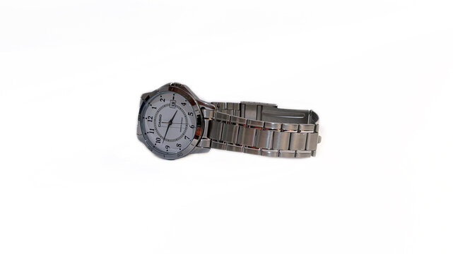 Kediri, East Java, Indonesia &ndash; August 16, 2026: Metallic Wristwatch with Dark Dial Photographed in Multiple Angles