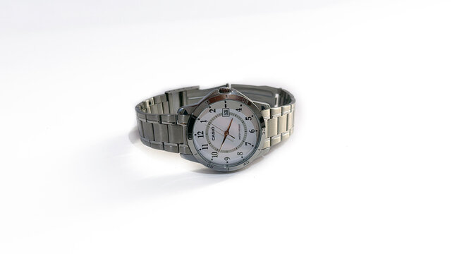 Kediri, East Java, Indonesia &ndash; August 16, 2026: Metallic Wristwatch with Dark Dial Photographed in Multiple Angles