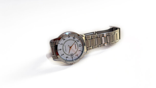 Kediri, East Java, Indonesia &ndash; August 16, 2026: Metallic Wristwatch with Dark Dial Photographed in Multiple Angles