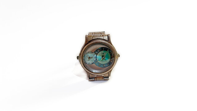 Kediri, East Java, Indonesia &ndash; August 16, 2026: Metallic Wristwatch with Blue Dial Photographed on White Background