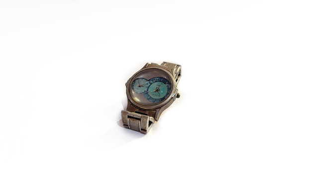 Kediri, East Java, Indonesia &ndash; August 16, 2026: Metallic Wristwatch with Blue Dial Photographed on White Background