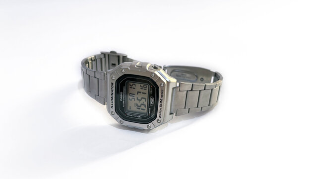 Kediri, East Java, Indonesia &ndash; August 16, 2026: Metallic Wristwatch with Rectangular Digital Face and Perforated Band Photographed on White Background