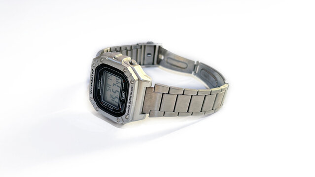 Kediri, East Java, Indonesia &ndash; August 16, 2026: Metallic Wristwatch with Rectangular Digital Face and Perforated Band Photographed on White Background