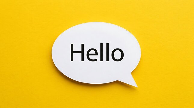 White speech bubble cutout featuring hello text placed centrally on yellow background backdrop
