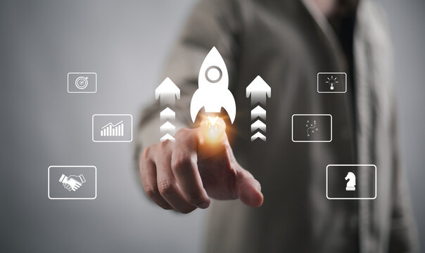 The startup business concept features a virtual touch screen, an activation icon, and an organizational growth strategy.
