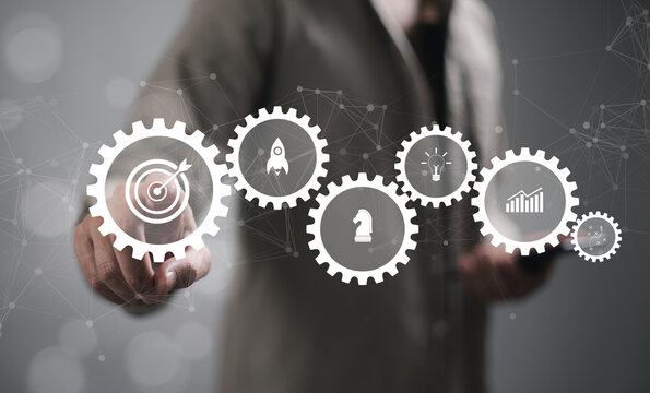 The startup business concept features a virtual touch screen, an activation icon, and an organizational growth strategy.