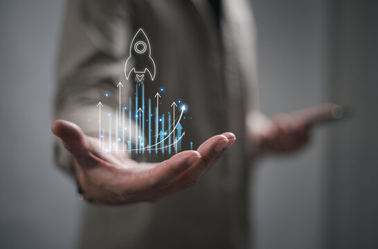 The startup business concept features a virtual touch screen, an activation icon, and an organizational growth strategy.