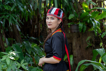 Fototapeta premium Close up portrait of Malaysian indigenous Dayak woman from Sarawak in Bidayuh traditional costume