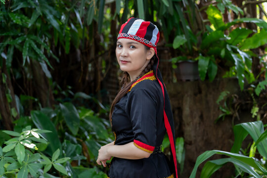 Close up portrait of Malaysian indigenous Dayak woman from Sarawak in Bidayuh traditional costume