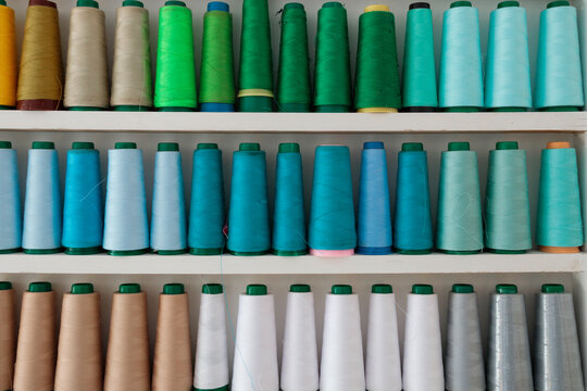 Rows of vibrant textile spools