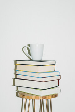 Coffee Mug on Stack of Books
