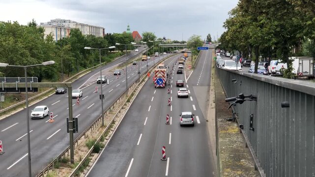 Traffic management trailer with illuminated arrow on Berlin A100 motorway