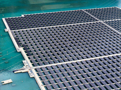 Aerial view of the floating solar farm on the reservoir, which helps reduce water evaporation, in Venaus, Piedmont, Italy.