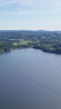 The right portion of Lac des Settons in Morvan, France, aerial vertical 9:16 view, aerial view.