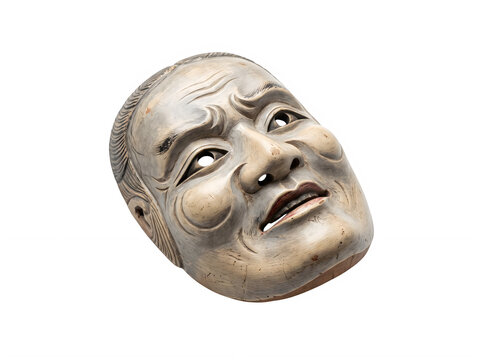 Old japanese theater mask with a sad expression showing traditional noh culture and dramatic wooden art