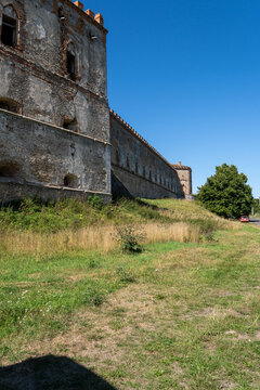 Long historic stone wall and palace tower of Medzhybizh fortress in Ukraine