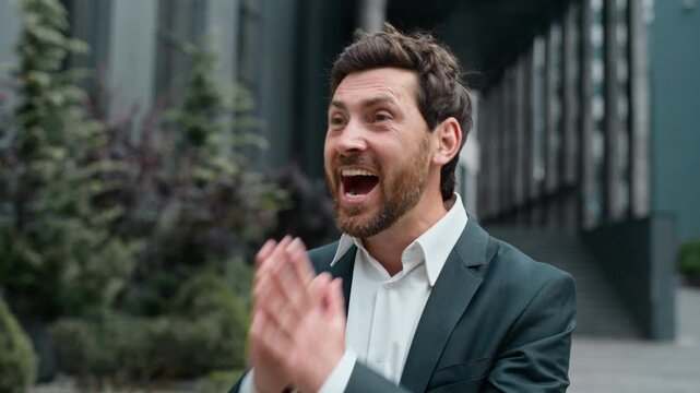 Happy middle-aged Caucasian business man saying wow amazed yelling winning rejoicing with good news success achievement mature businessman male employer agent yell surprised manager joyful win in city