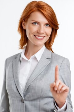 Businesswoman pointing finger up presenting solution or idea