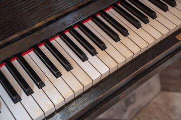 Detail of a section of old piano keys. © lapis2380