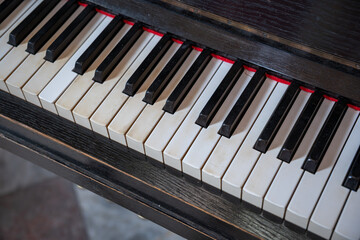 Detail of a section of old piano keys. © lapis2380