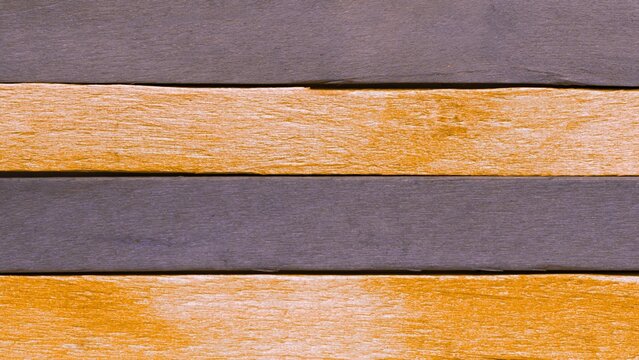 Wooden slat pattern with orange and gray planks for creative designs