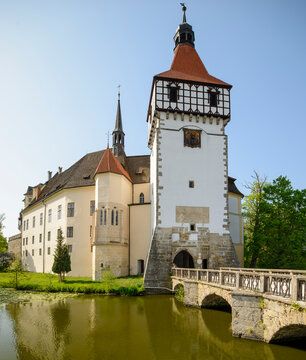 BLATNA, CZECH REPUBLIC - AUGUST 2017: Scenic view of the historic Blatna water castle surrounded by a moat during a sunny summer day.