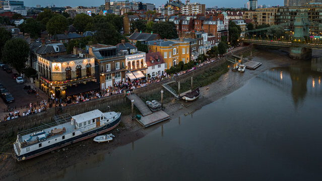 London, UK - 18.07.2026: Aerial View of Bustling Riverside Pubs along Upper Mall in Hammersmith