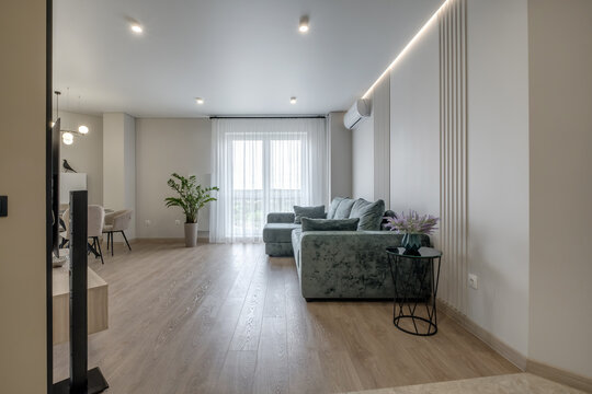 Interior of the modern luxure room and  work area  in studio apartments in minimalistic style