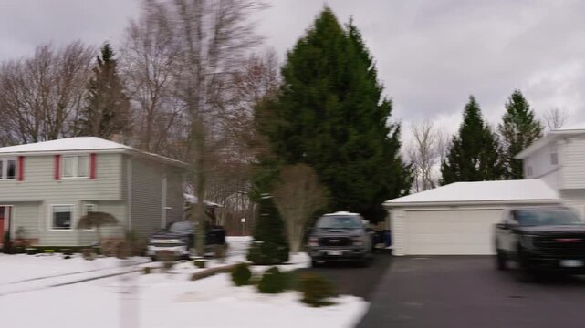 Snowy Split-Level House in a Typical American Suburb