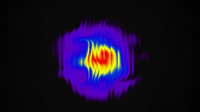 A vibrant heat map displays thermal energy distribution with a colorful gradient, showcasing temperature variations on black background. Loop animation