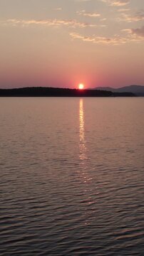 Stunning solar eclipse sunset over Cuerda del Pozo Reservoir in Spain