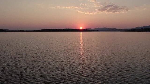 Total solar eclipse sunset over Cuerda del Pozo Reservoir in Soria