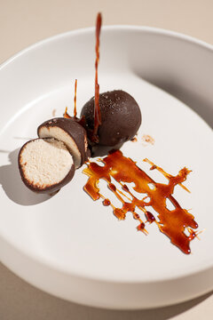 Chocolate glazed syrok curd dessert with caramel sauce