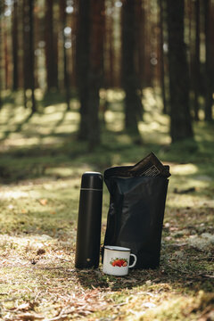 Camping coffee with drip bag, thermos and enamel cup