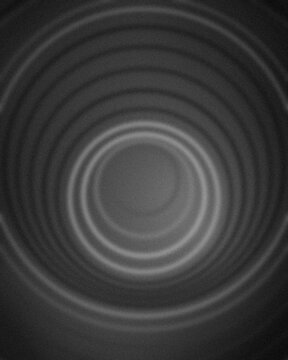 Abstract black and white concentric circle pattern for modern design and tech backgrounds