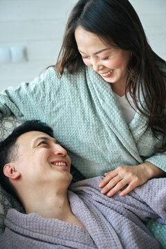 Happy couple share a warm intimate moment at home